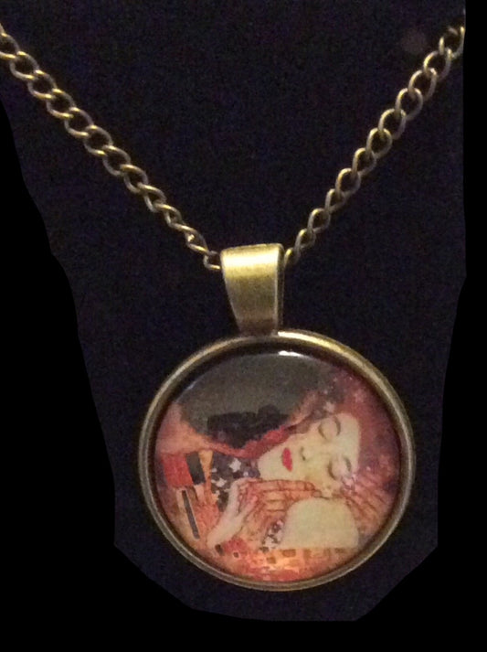 Glass Cabochon “The Kiss” Bezel Set Necklace Bronze